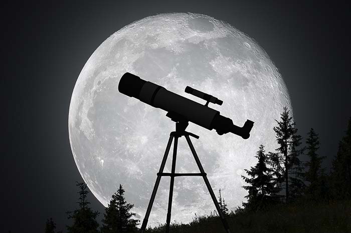 telescope against a large full moon