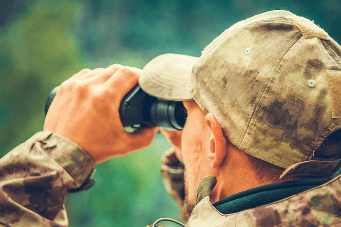 a man with binoculars