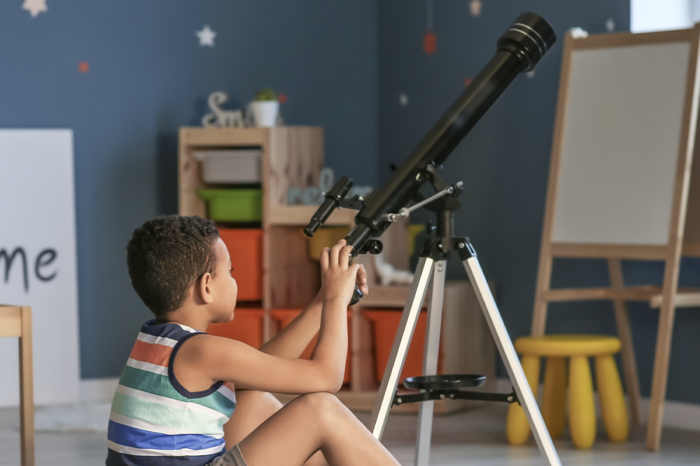 boy with telescope